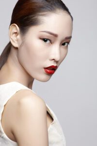 A model using our product Botox Cosmetic Treatment, Dermal Fillers, Double Chin Treatment, Skin Booster Treatment, Platelet-rich Plasma Injection, Thermage Treatment, Titan Skin Tightening Technology, Pearl Fractional Laser Treatment, Laser Genesis Treatment, Laser Toning Treatment, 3D Skin Rejuvenation Treatment, Intense Pulsed Light Therapy, Viora Radio Frequency Treatment, Blue Light Photodynamic Therapy, Laser Hair Removal, V-line Botox Treatment, Acne Scars Treatment, AviClear Laser Treatment, rosacea laser treatment, double chin removal, skin tightening treatment, Treatments for Uneven Skin Tone, Pigmentation Treatment, pore treatment, sweating botox treatment, Hair Loss Treatments, Non-Contact Fat Reduction, CoolSculpting, Redefining Muscle Sculpting, Ideal Protein Weight Loss Program, Microneedling Therapy, Microdermabrasion Therapy, and Chemical Peel by Trinity Medispa a Medical Cosmetic Clinic in Toronto located at 3434 Yonge St., Toronto, ON M4N 2M9.