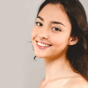 A model using our product Botox Cosmetic Treatment, Dermal Fillers, Double Chin Treatment, Skin Booster Treatment, Platelet-rich Plasma Injection, Thermage Treatment, Titan Skin Tightening Technology, Pearl Fractional Laser Treatment, Laser Genesis Treatment, Laser Toning Treatment, 3D Skin Rejuvenation Treatment, Intense Pulsed Light Therapy, Viora Radio Frequency Treatment, Blue Light Photodynamic Therapy, Laser Hair Removal, V-line Botox Treatment, Acne Scars Treatment, AviClear Laser Treatment, rosacea laser treatment, double chin removal, skin tightening treatment, Treatments for Uneven Skin Tone, Pigmentation Treatment, pore treatment, sweating botox treatment, Hair Loss Treatments, Non-Contact Fat Reduction, CoolSculpting, Redefining Muscle Sculpting, Ideal Protein Weight Loss Program, Microneedling Therapy, Microdermabrasion Therapy, and Chemical Peel by Trinity Medispa a Medical Cosmetic Clinic in Toronto located at 3434 Yonge St., Toronto, ON M4N 2M9.